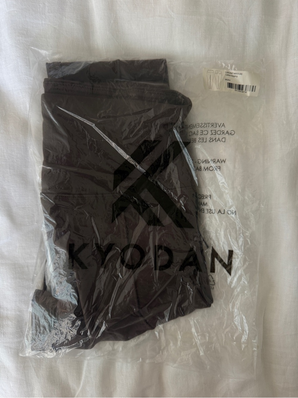 NWT packaged brown XS leggings by Kyodan